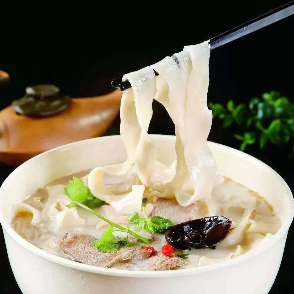 Hand-pulled noodles in a clear beef broth