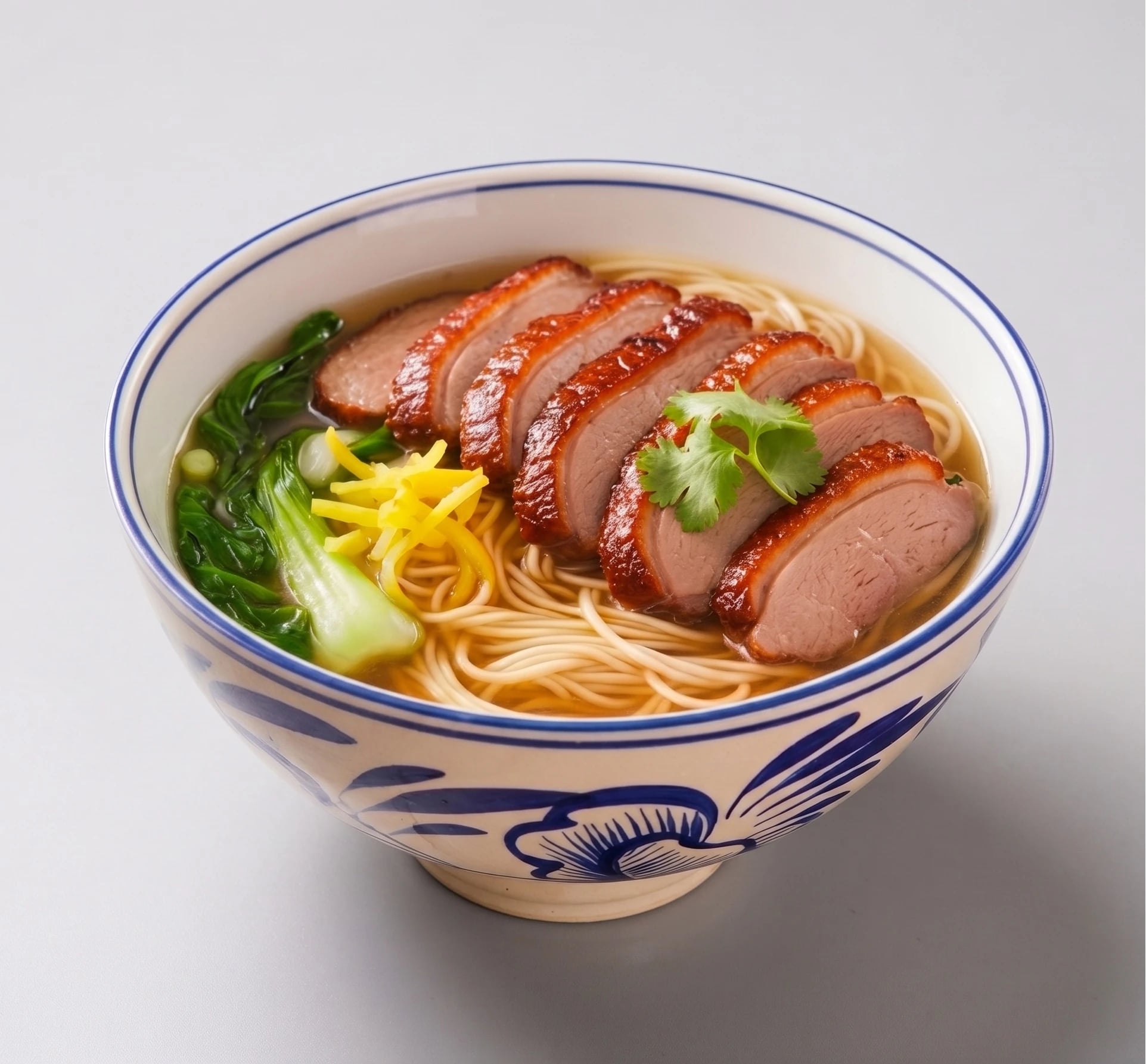 Roast duck noodles with bok choy in clear broth